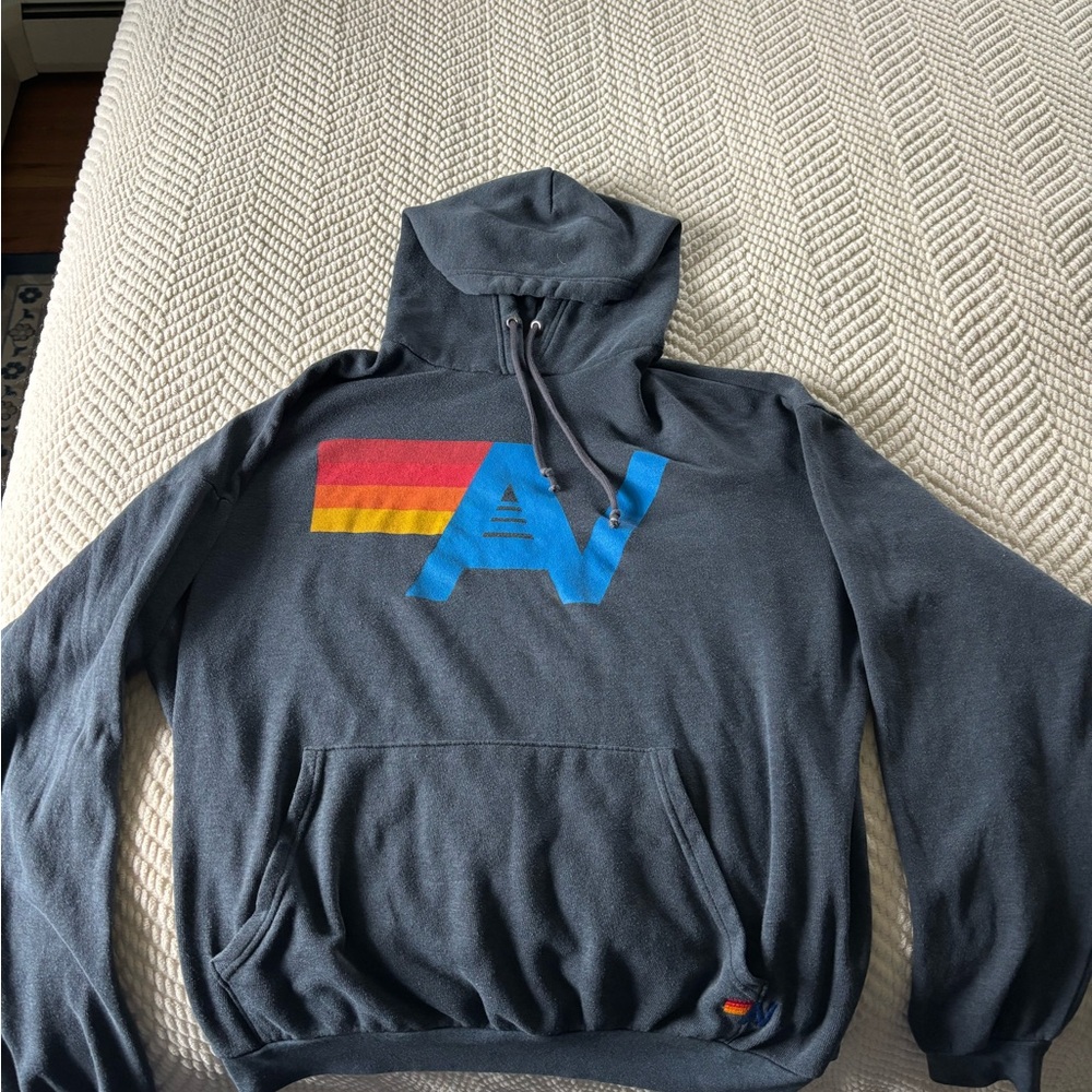 Aviator Nation Charcoal Hoodie with Blue Logo and Red-Yellow Stripes